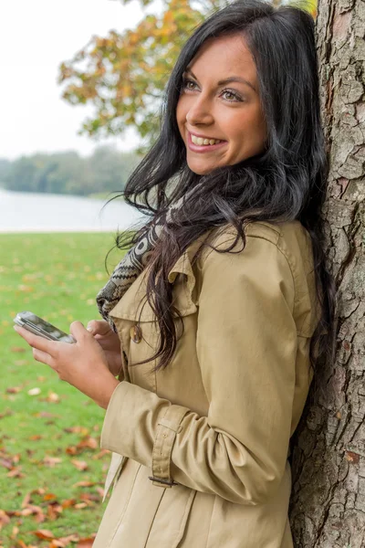 Woman writes sms — Stock Photo, Image