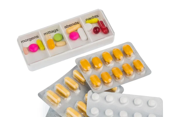 Dispensador de comprimidos e comprimido — Fotografia de Stock