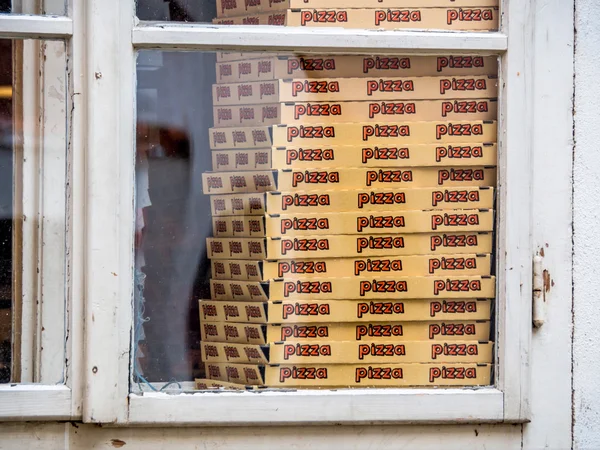 Boxes for pizza in a pizzeria. street sales in the — Stock Photo, Image
