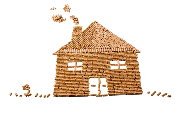 From pellets for heating house — Stock Photo, Image