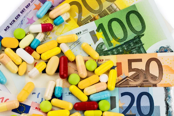 Eurobiljetten en tabletten — Stockfoto