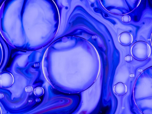 Colors mix with water and oil — Stock Photo, Image