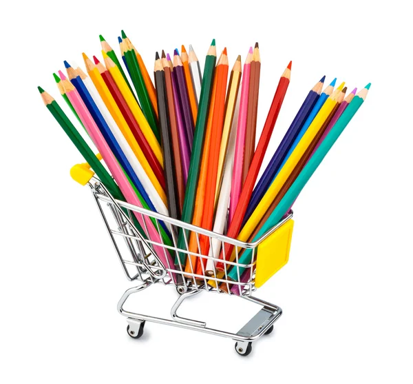 Colored pencils in shopping cart — Stock Photo, Image