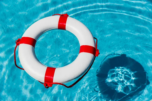 Lifebuoy in a swimming pool — Stock Photo, Image