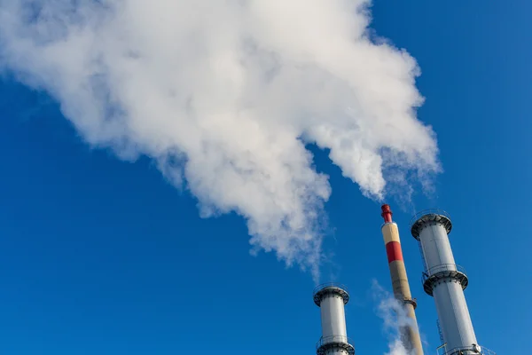 Fuming industrial chimney — Stock Photo, Image