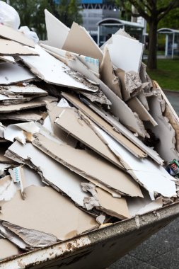 rubble. gypsum boards in the container clipart
