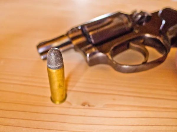 Revolver with a cartridge — Stock Photo, Image