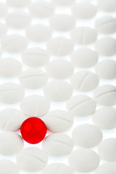 Tablets in white and red — Stock Photo, Image