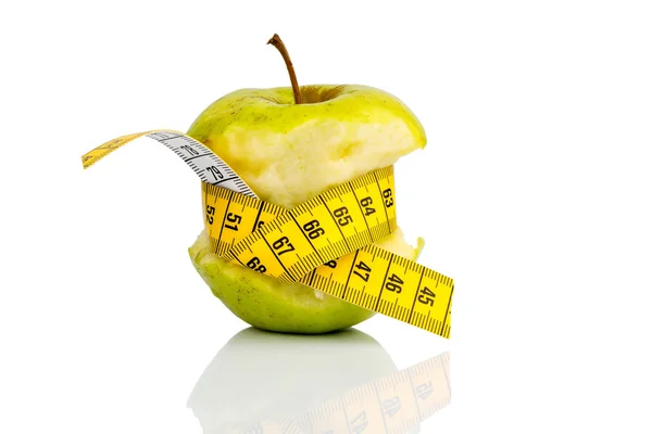 Apple with measuring tape on — Stock Photo, Image