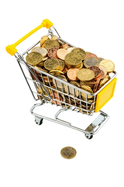 Coins in shopping cart — Stock Photo, Image