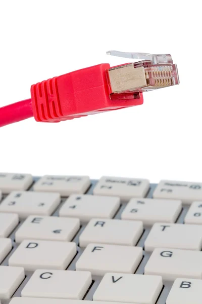 Cable de red en el teclado — Foto de Stock