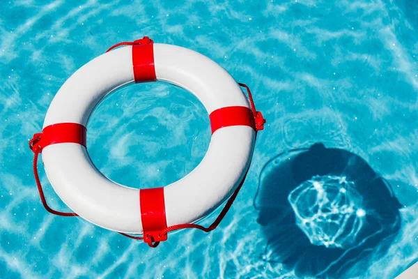 Lifebuoy in a swimming pool — Stock Photo, Image