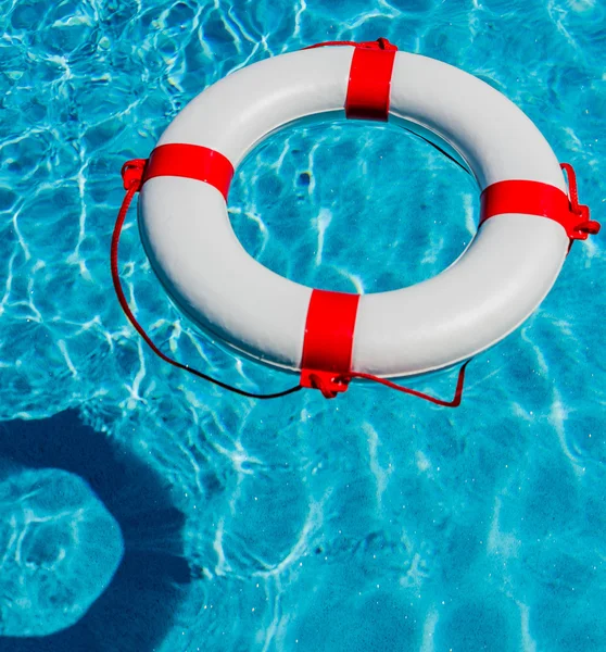 Lifebuoy in a swimming pool — Stock Photo, Image