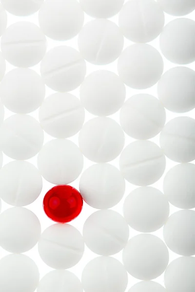 Tablets in white and red — Stock Photo, Image