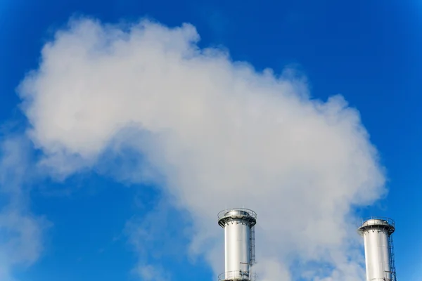 Industrial chimney with exhaust gases — Stock Photo, Image