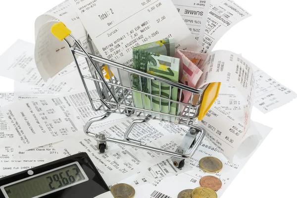 Shopping cart, receipts and money — Stock Photo, Image