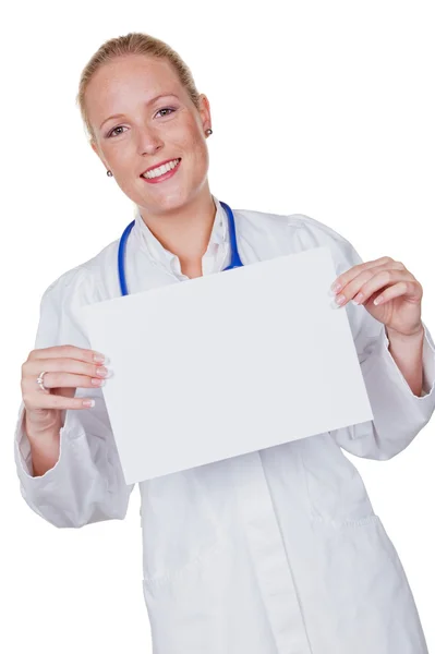 Ärztin mit Stethoskop und Schild — Stockfoto