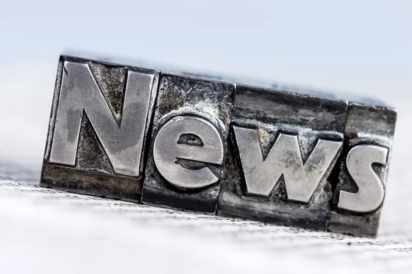 News in lead letters — Stock Photo, Image