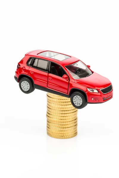 Rising car costs. car on coins — Stock Photo, Image