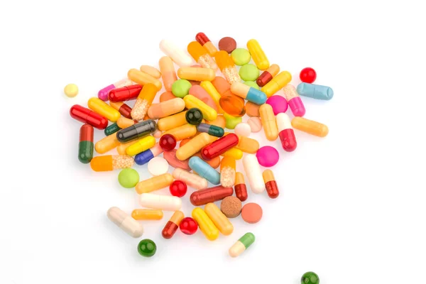 Mnoho barevných pilulek — Stock fotografie