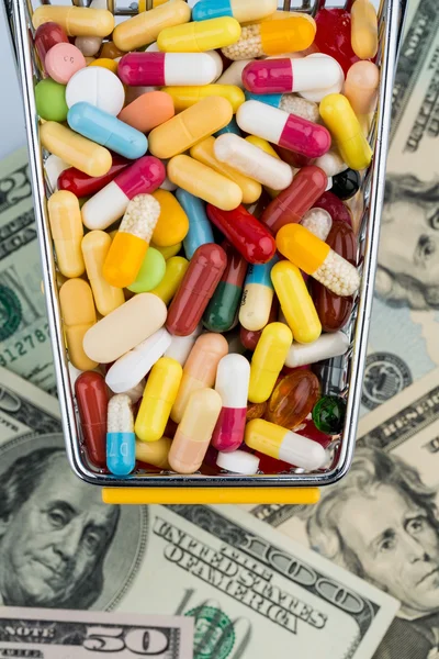 Tablety, nákupní vozík, dolar — Stock fotografie