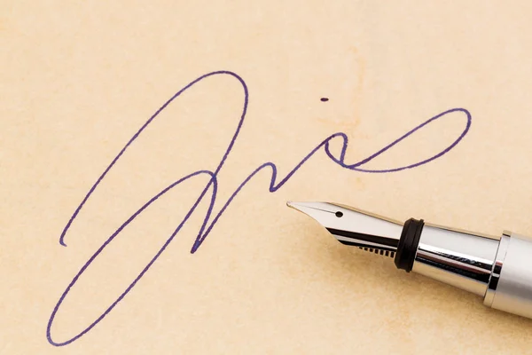 Signature and fountain pen — Stock Photo, Image