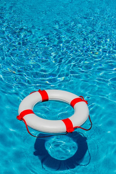 Lifebuoy in a swimming pool — Stock Photo, Image