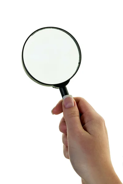 Hand with a magnifying glass — Stockfoto