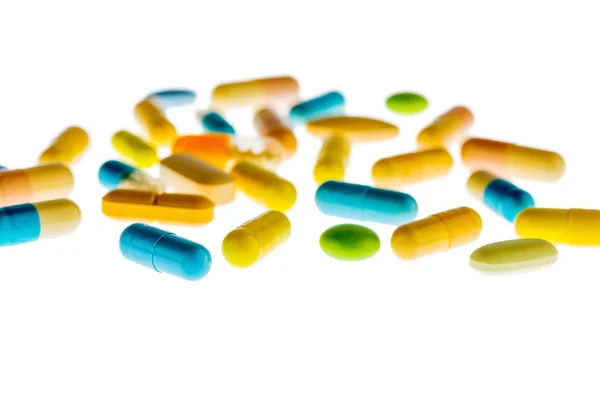 Tabletter på ljus bakgrund — Stockfoto
