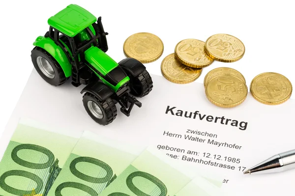 Purchase contract for new farm tractor — Stock Photo, Image