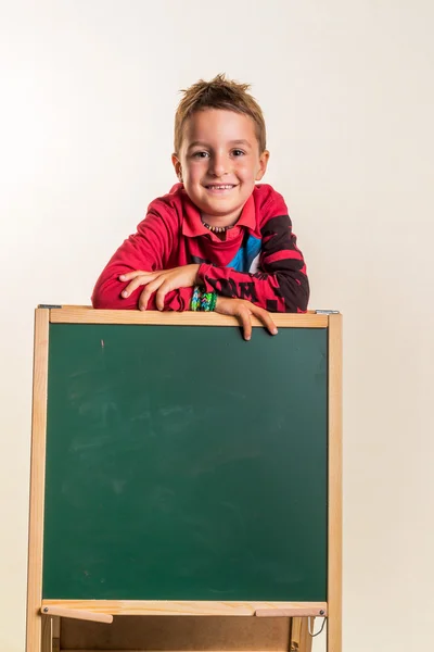 School child with school board — Stock Photo, Image