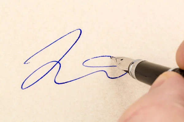 Signature on a contract — Stock Photo, Image