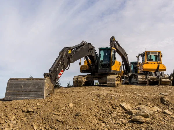 道路建筑工地的挖掘机 — 图库照片