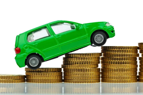 Car and coins. rising cost car — Stock Photo, Image