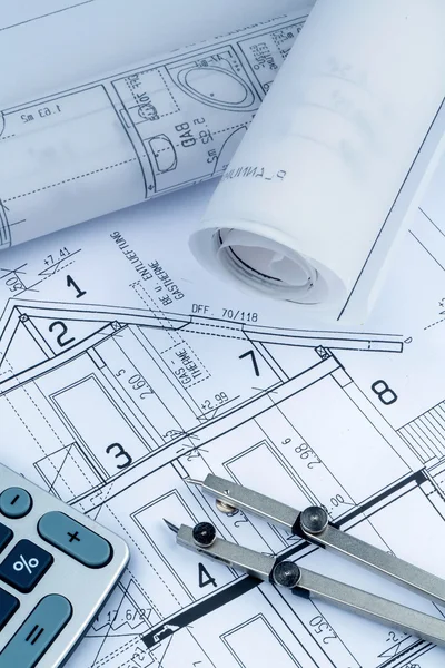 Plan van het huis met calculator — Stockfoto