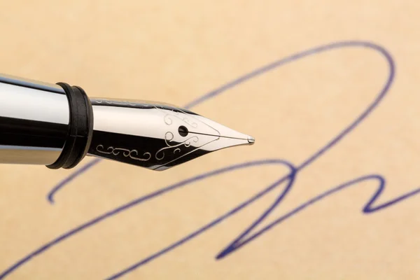 Signature and fountain pen — Stock Photo, Image