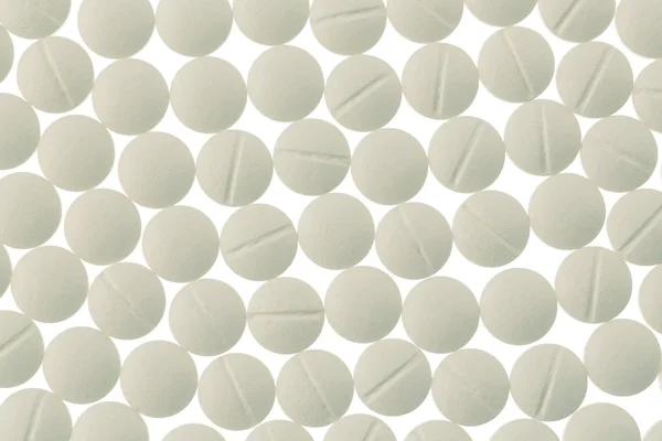 White tablets in abundance — Stock Photo, Image