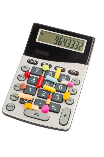 Tabletki i kalkulatory — Zdjęcie stockowe