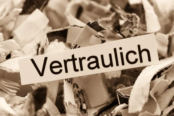 Geschreddertes Papier Stichwort vertraulich — Stockfoto