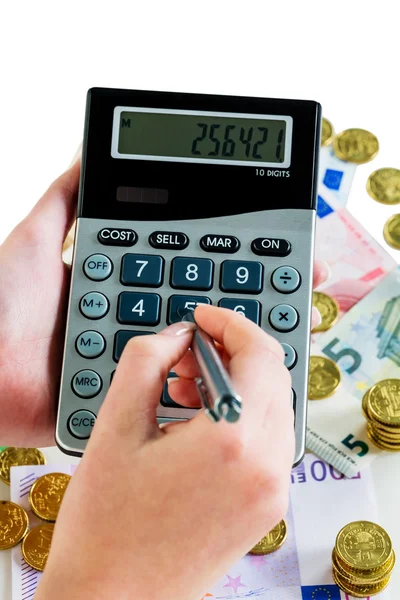 Mano con calculadora y dinero — Foto de Stock