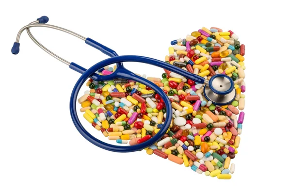 Stetoskop i tabletki w kształcie serca — Zdjęcie stockowe