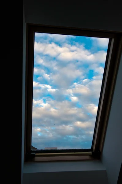 Sky, clouds, roof window — Stock Photo, Image