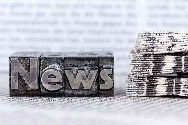 News in lead letters — Stock Photo, Image