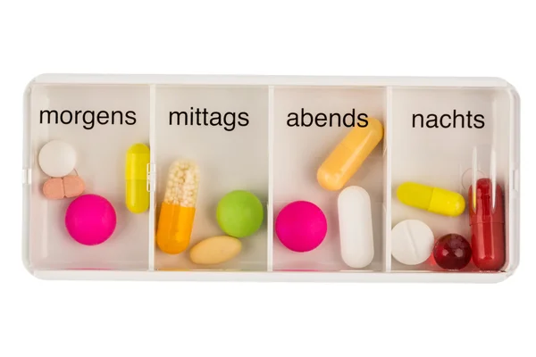 Tablettenspender und Tabletten — Stockfoto