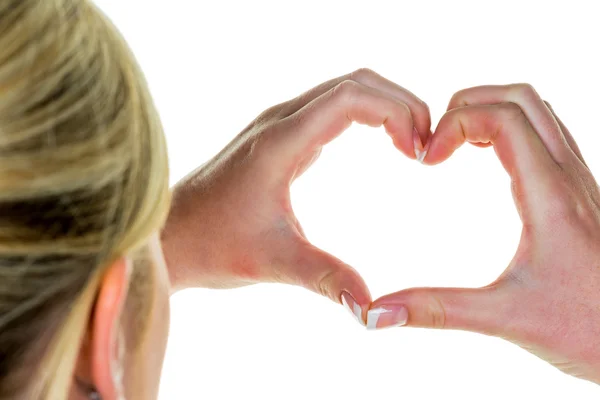 Manos dando forma a un corazón —  Fotos de Stock