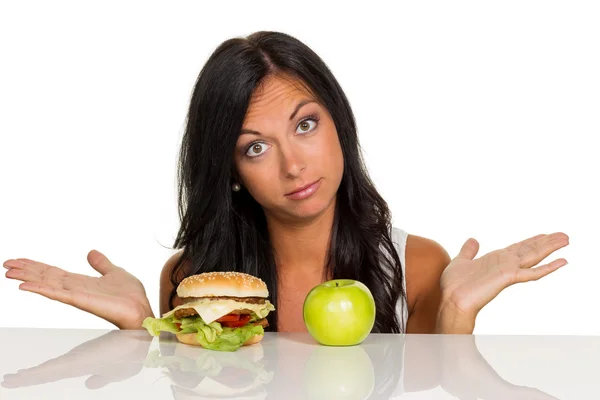 Wahl zwischen Burger und Apfel — Stockfoto