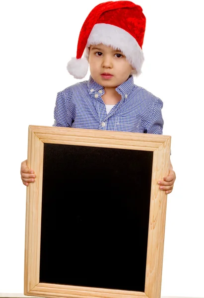 Liten pojke med jultomten hatt — Stockfoto