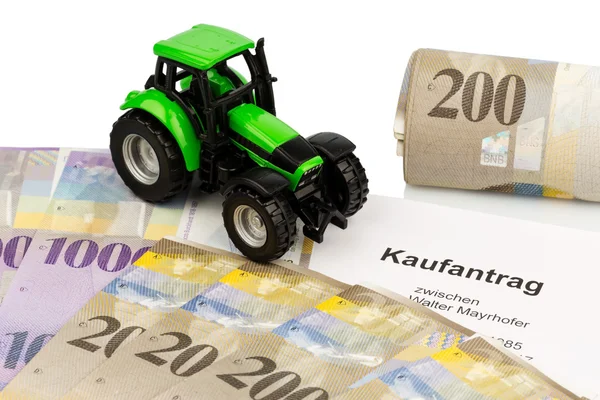 Purchase contract for new farm tractor — Stock Photo, Image