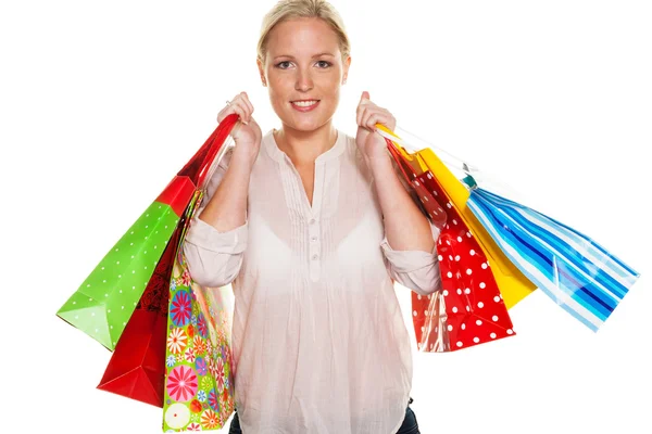 Woman with shopping bags while shopping Royalty Free Stock Photos