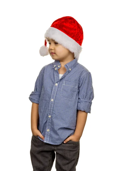 Liten pojke med jultomten hatt — Stockfoto